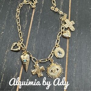 Alquimia Gold Charm Necklace with Bohemian Elegance